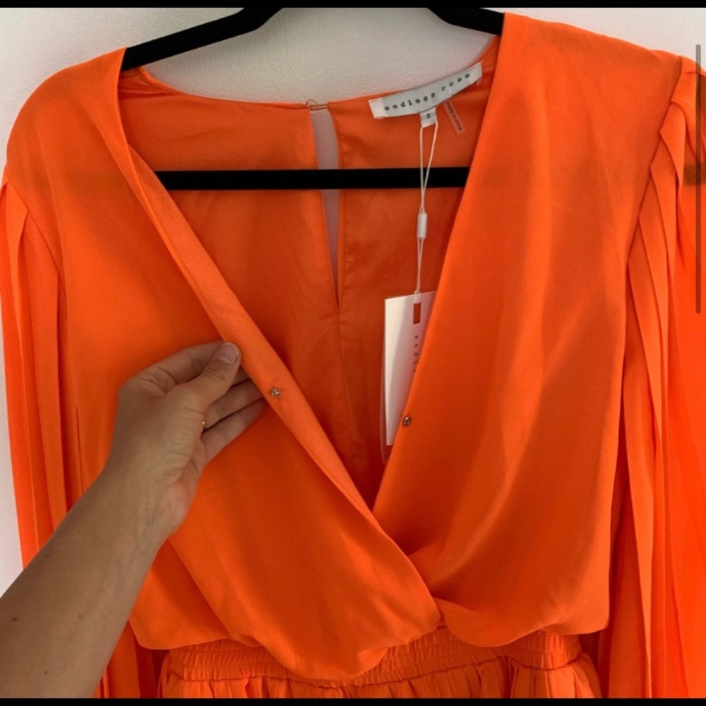 Endless Rose pleated romper. NWT